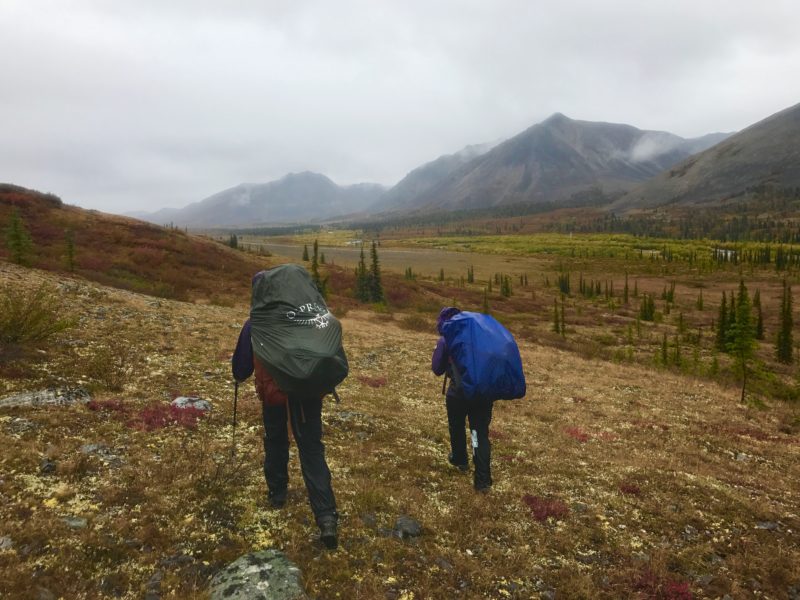 Two hikers on a rainy day in the Arctic National Wildlife Refuge